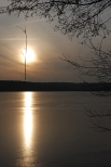 Zachodzące słońce nad jeziorem Wysokie Brodno. Żmijewo