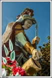 Sulmierzyce - figura w. Floriana przy barokowym kociele parafialnym pw. Wniebowzicia NMP