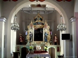 ołtarz główny w stylu rokokowo-neogotyckim z 1860 ze św. Szymonem z Lipnicy
