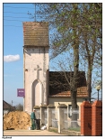 Rychwał - Zespół Kościoła Parafialnego pod wezwaniem Św. Trójcy, murowana dzwonnica z 1914 roku