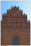 Kazimierz Biskupi - Klasztor Misjonarzy Świętej Rodziny, ściana kościoła p.w. Jana Chrzciciela i Pięciu Braci Męczenników