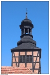 Kazimierz Biskupi - klasztor i kościół p.w. Pięciu Braci Męczenników, wieża bramna, pełniąca jednocześnie rolę dzwonnicy